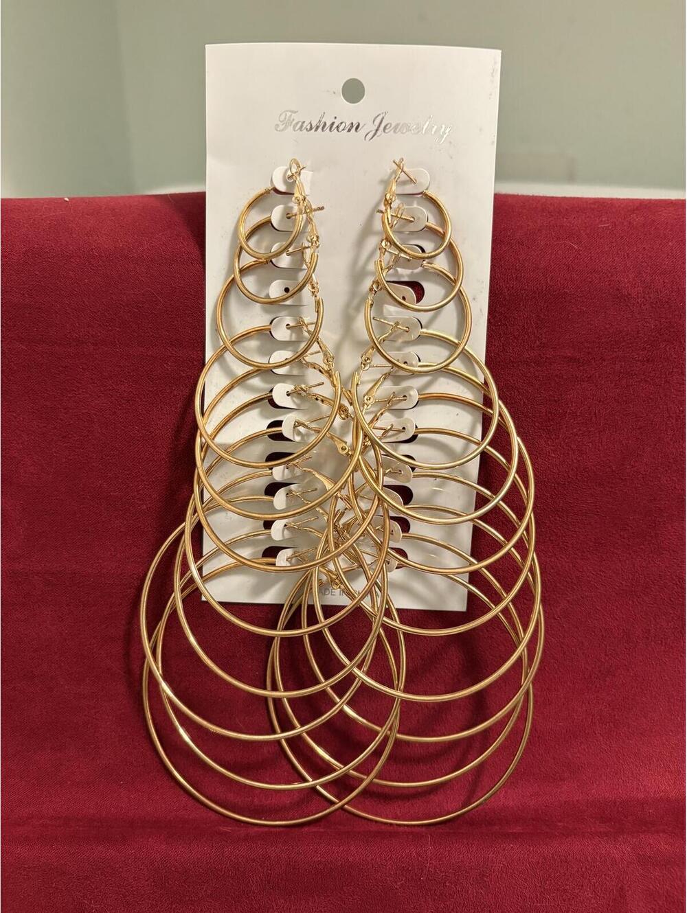 11 Pairs of Gold Tone Hoop Earrings Multiple Sizes